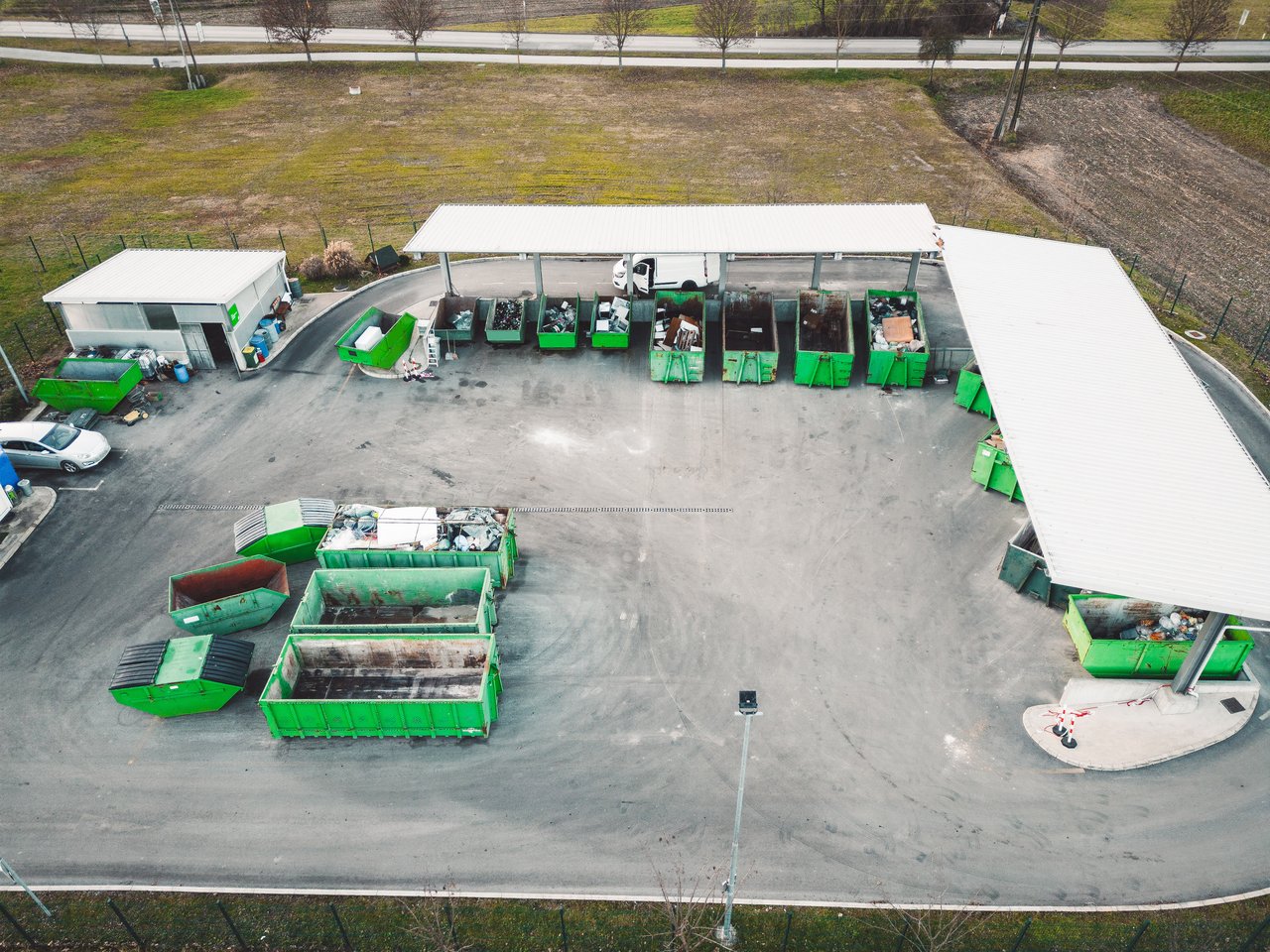 aerial-view-of-a-small-recycling-center-with-diffe-2023-11-27-05-29-36-utc